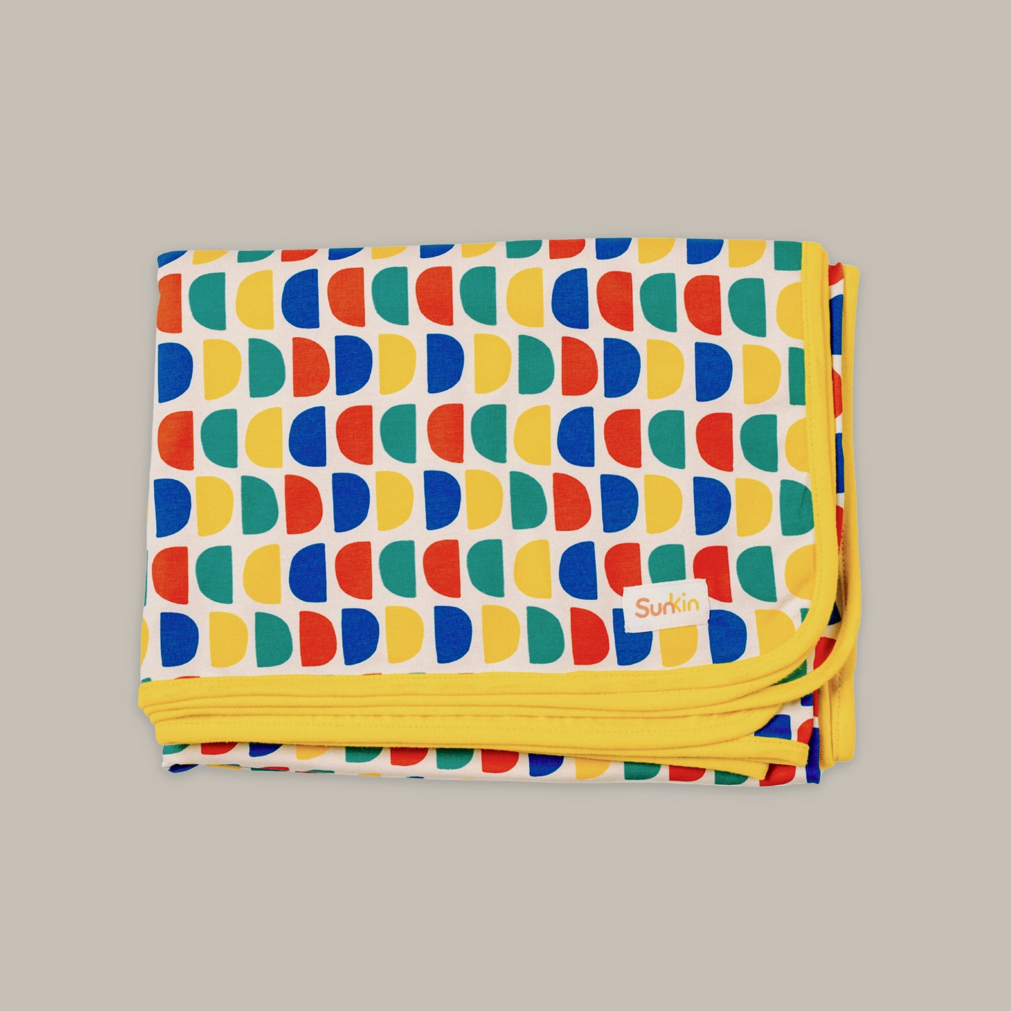 Bright multi D print sun blanket for covering up shoulders on sunny days