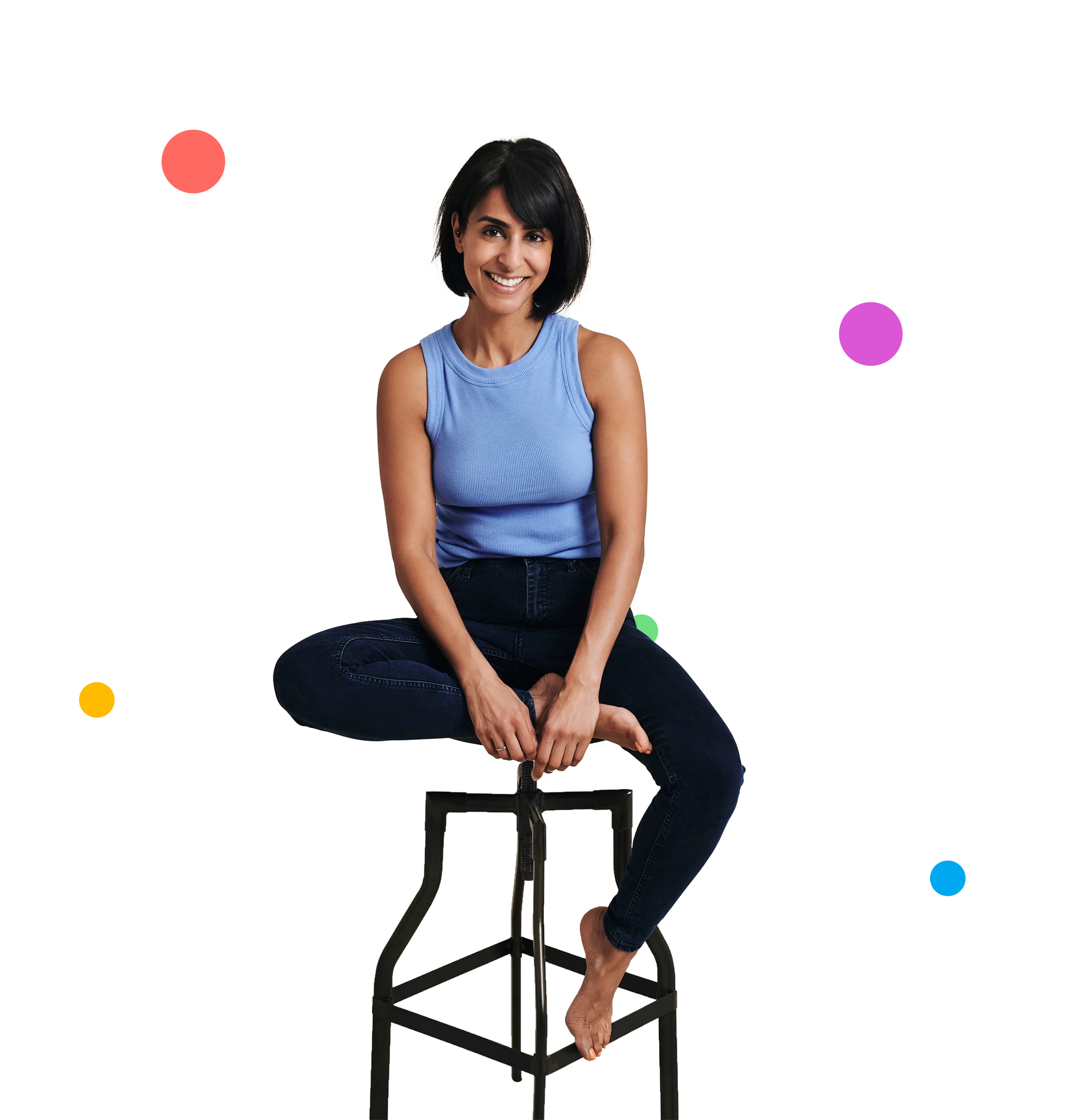 Dee, founder of SunKin, sitting on a stool smiling, sharing the story behind creating UPF50+ sun-safe apparel for kids