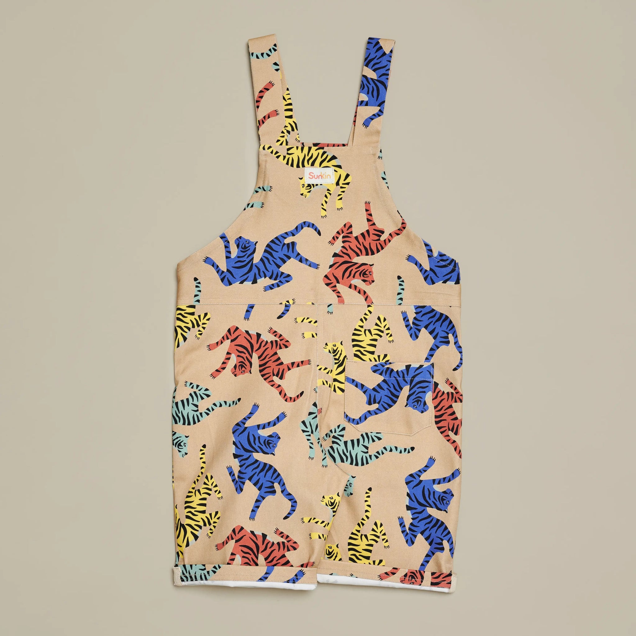 Back view of Tiger Print UPF50+ kids dungarees by SunKin—breathable cotton twill with contrast hem and relaxed fit.