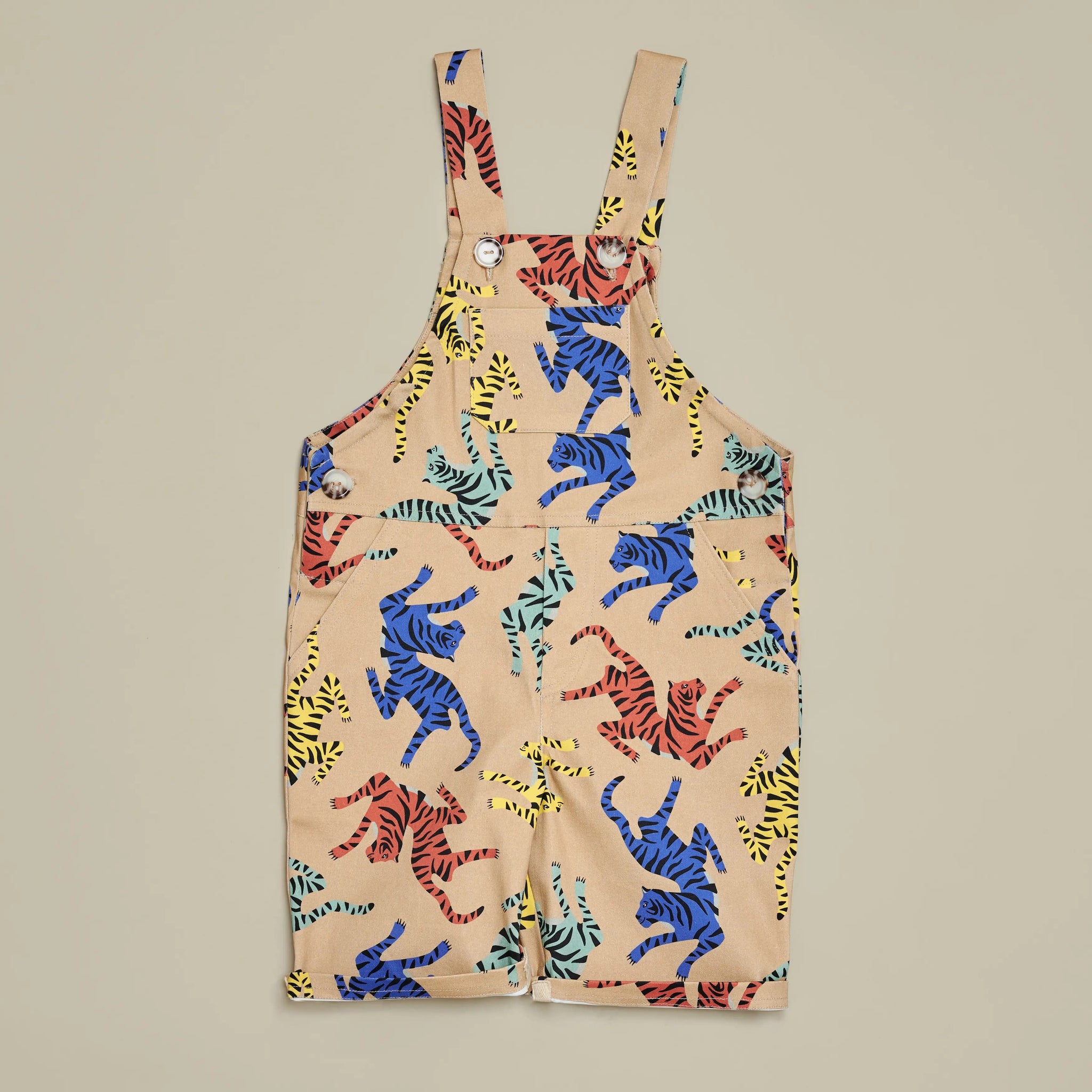 Front view of SunKin’s UPF50+ Tiger Print Shortaree for kids—sun-safe cotton dungarees with adjustable straps and roomy pockets.