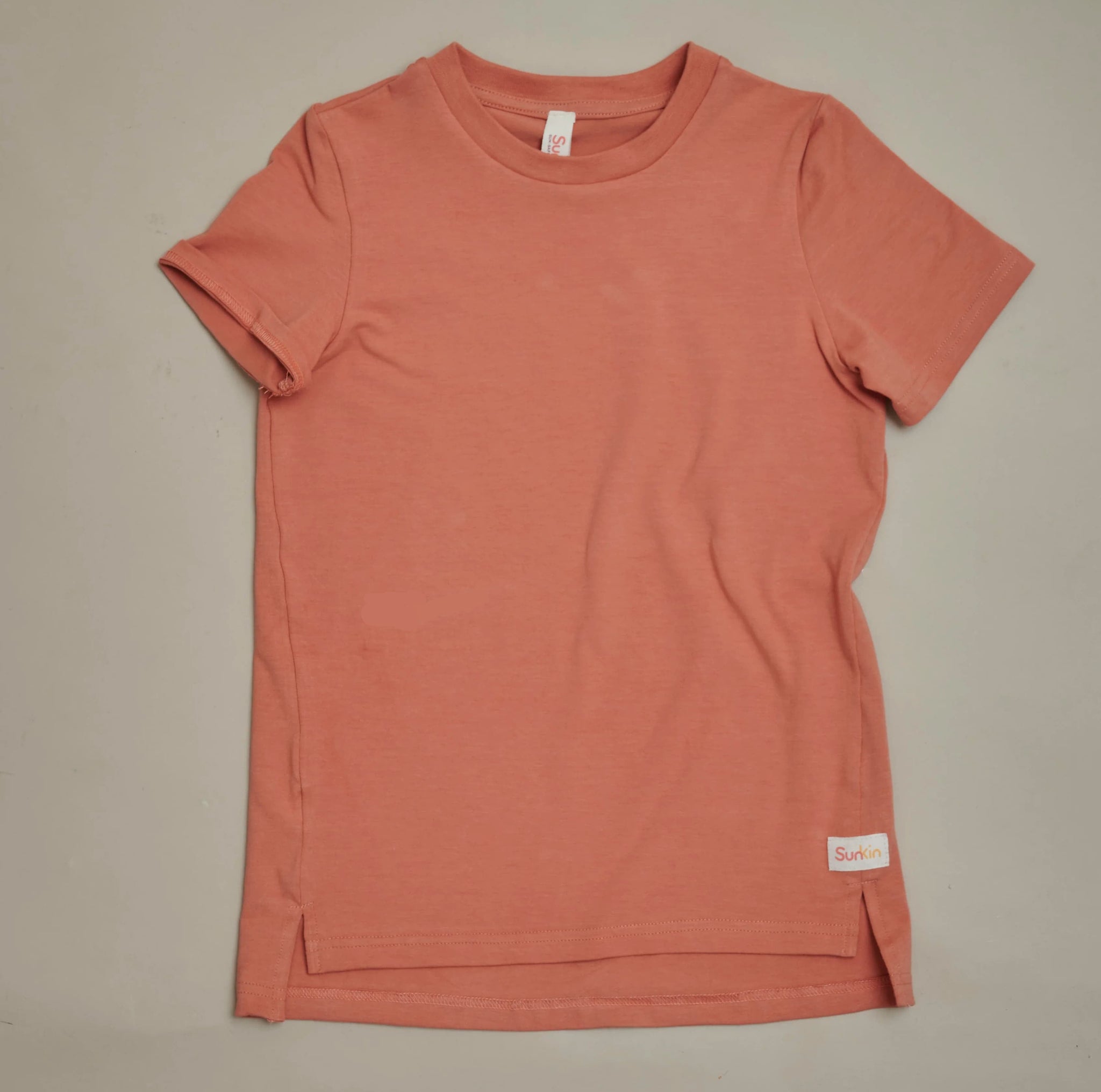 Apricot UPF50+ t-shirt for kids—CANSA-endorsed cotton with smart side seams and relaxed sun-safe design