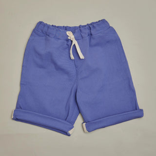 Front view of SunKin’s Violet UPF50+ woven shorts—sun-safe, breathable cotton with drawstring waist and side pockets.